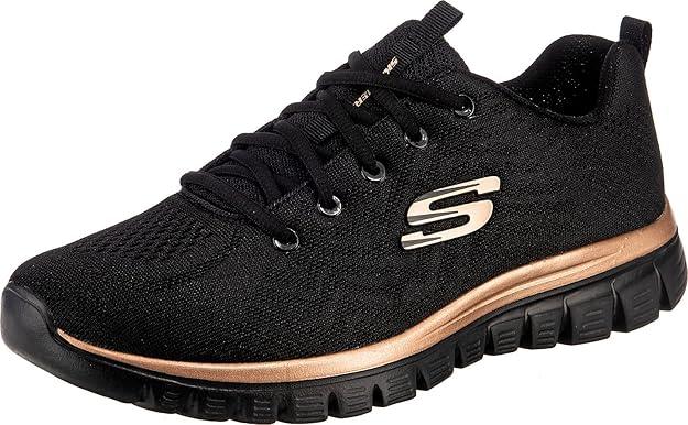 Sneaker streetwear nera con tomaia in tessuto, suola nera con dettagli metallici oro bronzo, stile urban