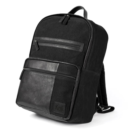 K0023AB | Notebook backpack in Canvas/Genuine Leather, full grain, flywheel - Black colour. Accessories in antiqued nickel, zip closure. Dimensions: 29 x 40 x15 cm. Packaging: TNT bag - STREET STYLE