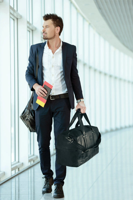 K0024AB | Borsone da Viaggio in Canvas/Vera Pelle, pieno fiore, volanata - Colore Nero. Accessori Nickel Anticato, Chiusura con lampo. Dimensioni: cm 48 x 31 x 22 - Confezione: Sacchetto Tnt - STREET STYLE