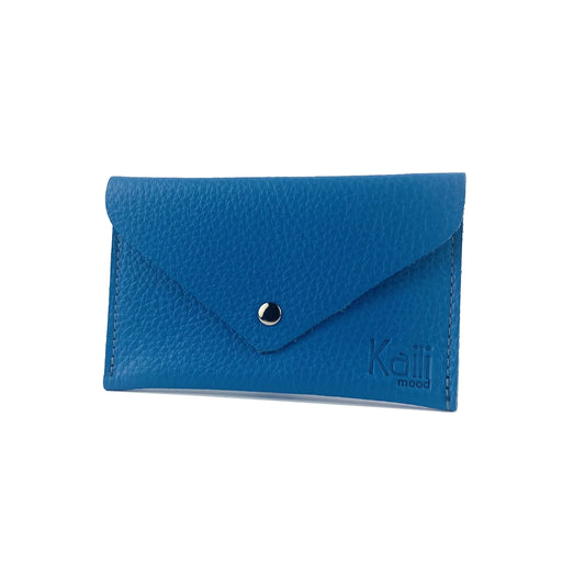 K0040OB | Sachet with flap Made in Italy in genuine full grain leather, dollar grain - Color light blue - Dimensions: 13 x 8 x 0.5 cm - Packaging: Rigid bottom/lid gift box - STREET STYLE