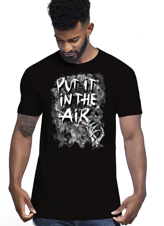 T-shirt uomo nera streetwear in cotone con stampa grafica 'Put it in the air', disegno mano scheletrica e fumo, stile urban