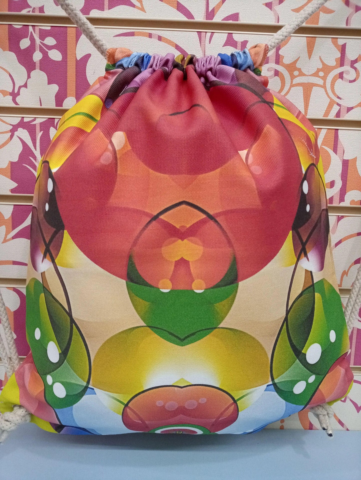 Zaino a sacca streetwear con stampa astratta colorata, tessuto effetto vetro, cordoncini bianchi