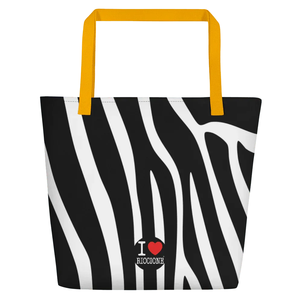 Shopper streetwear con stampa zebrata bianca e nera, manici gialli, scritta I love Riccione