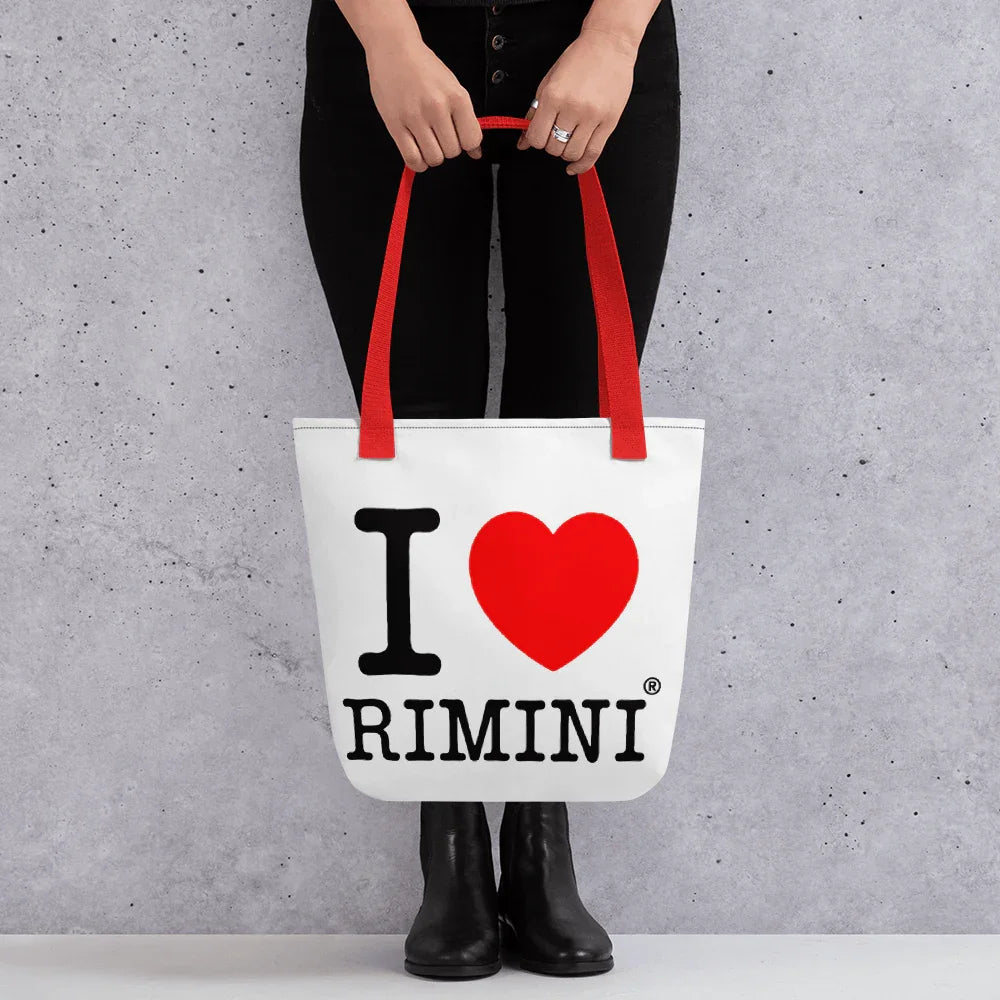Borsa tote bianca streetwear con manici rossi, scritta I love Rimini nera e cuore rosso stampato.